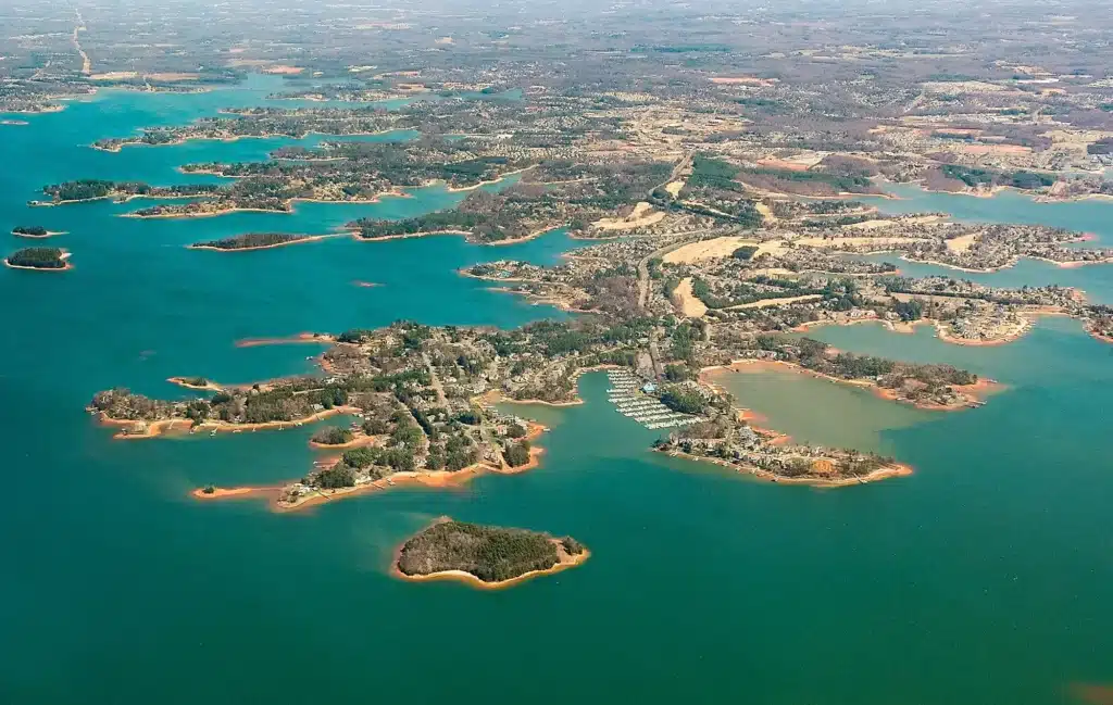 Aerial view of Lake Norman State Park showcasing its expansive lakeside beauty from an aerial perspective.
