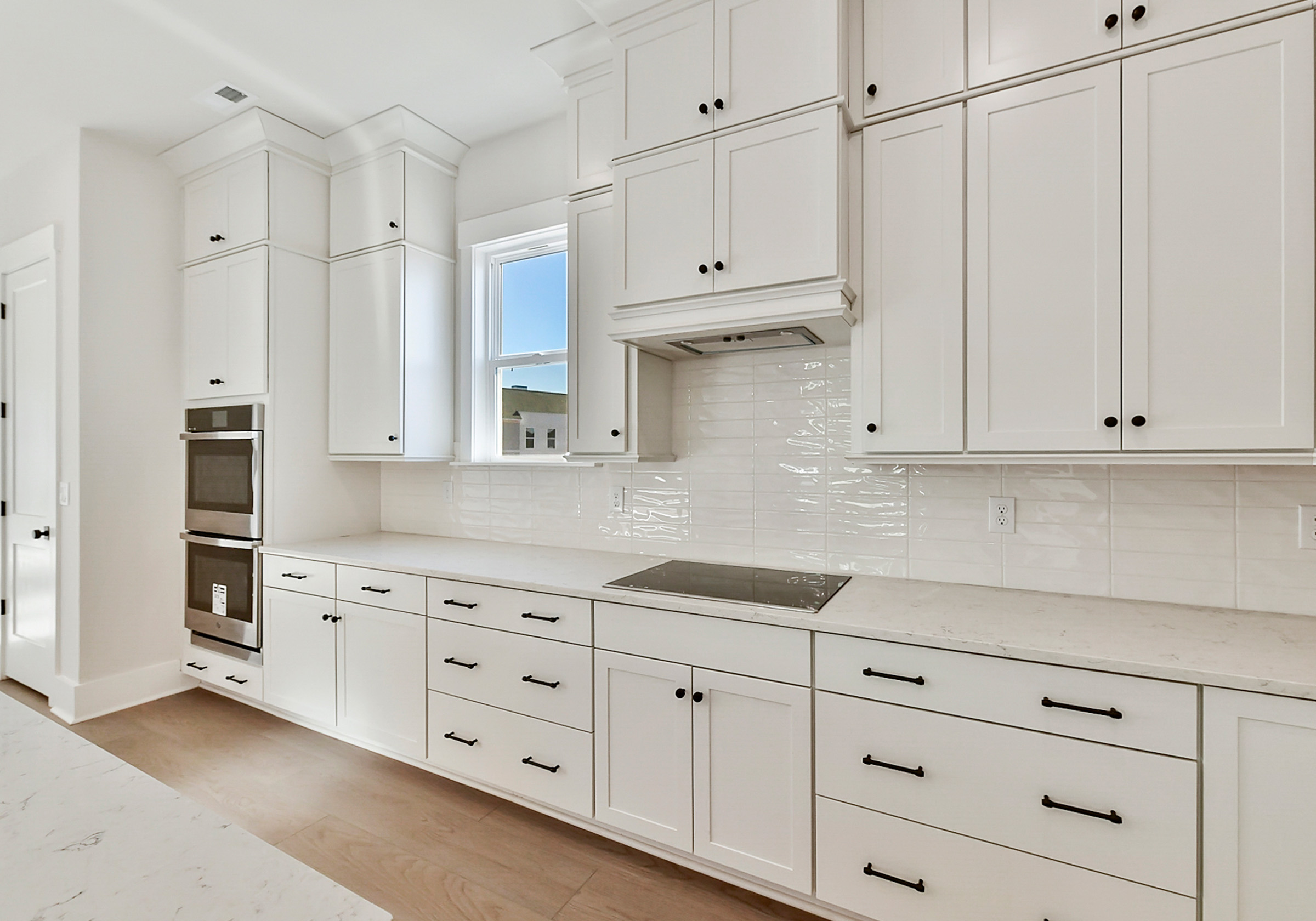 - View 5, Opens Model BoxAn interior shot of the kitchen of 4379 Morning Mist Drive, focused on the kitchen and the counters.