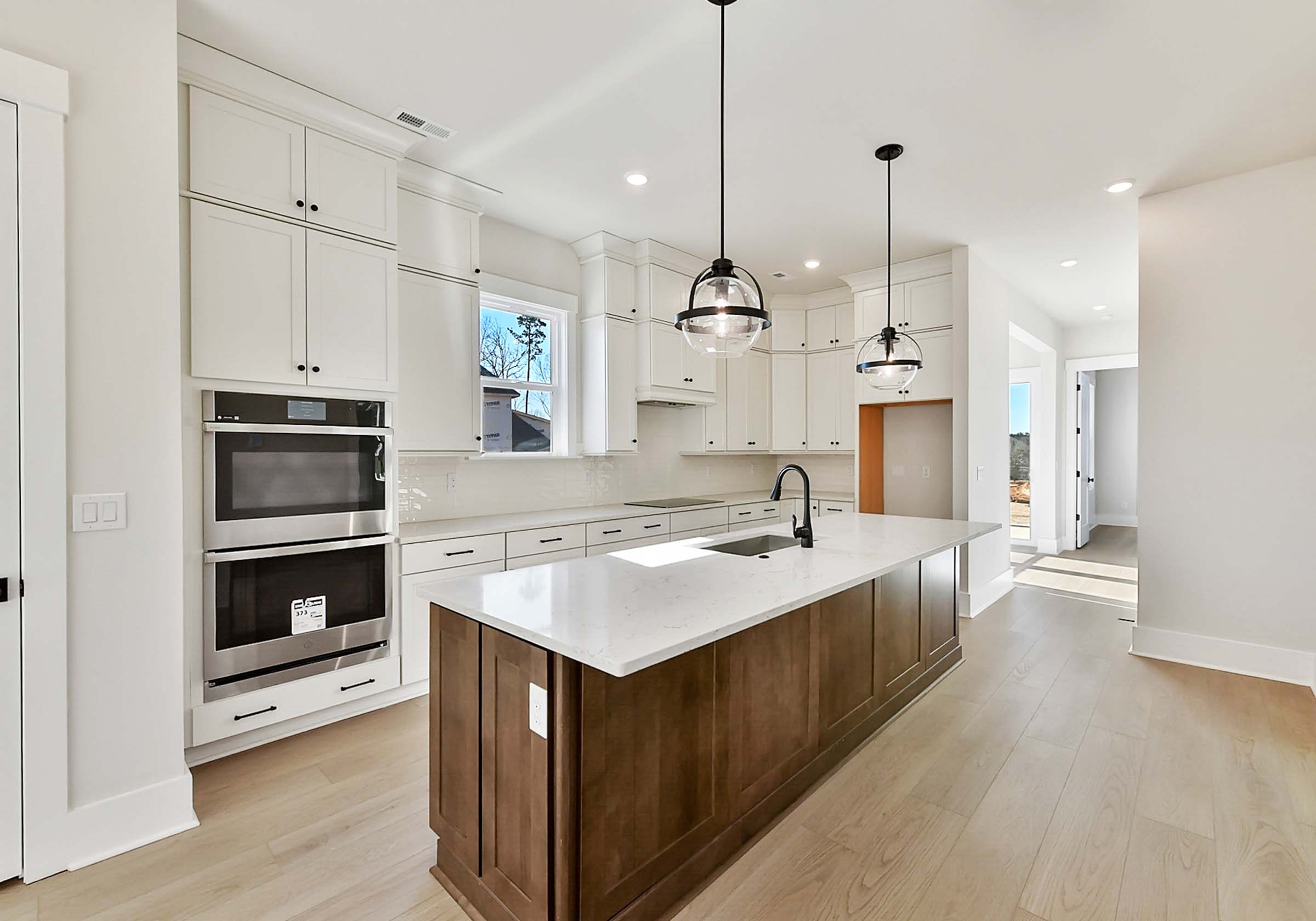 - View 3, Opens Model BoxAn interior shot of the kitchen of 4379 Morning Mist Drive, focused on the entire kitchen.