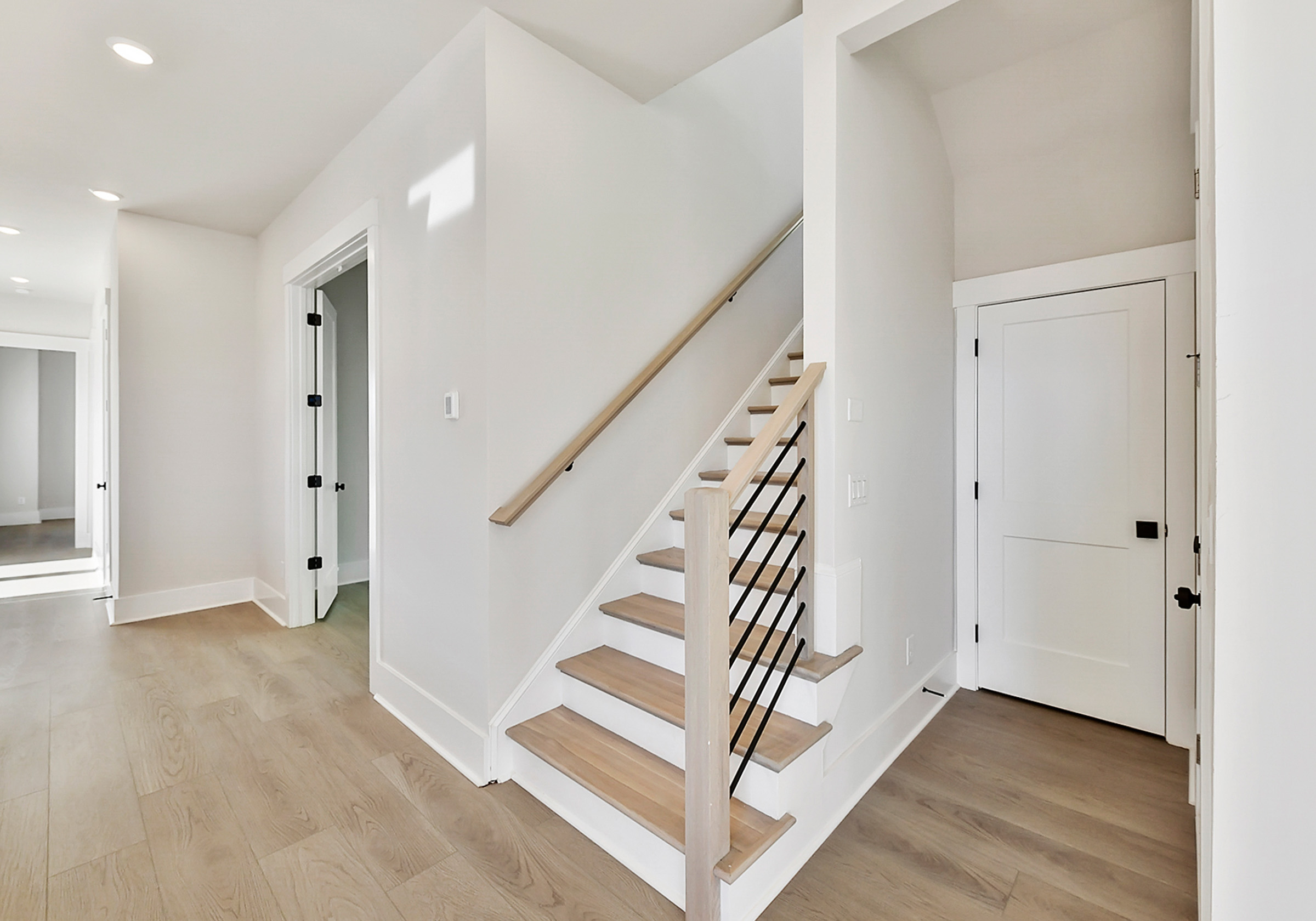 - View 10, Opens Model BoxAn interior shot of the staircase and hallway of 4379 Morning Mist Drive.